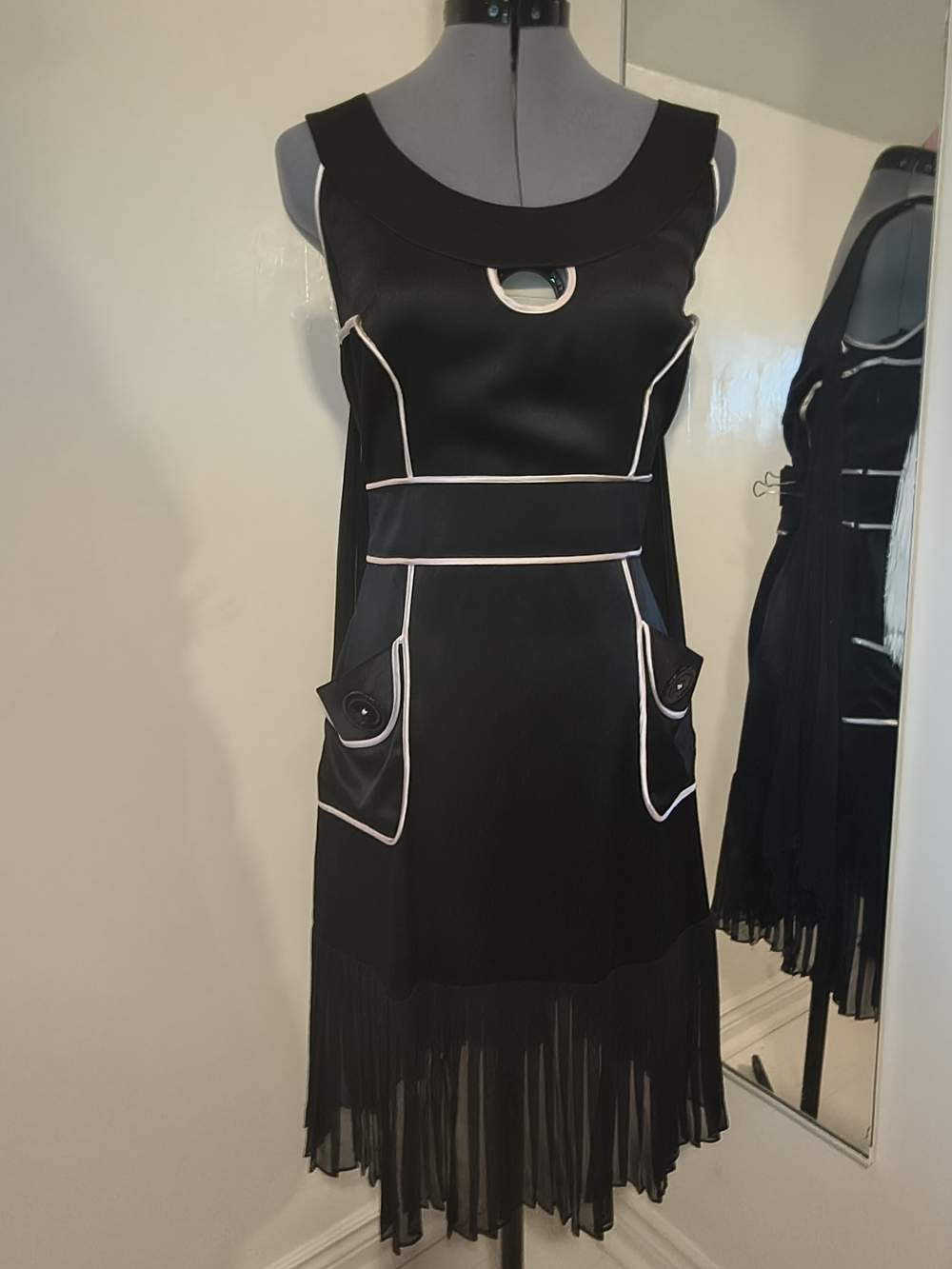 Black Sleeveless Asymmetrical Dress with White Trim and Fringe